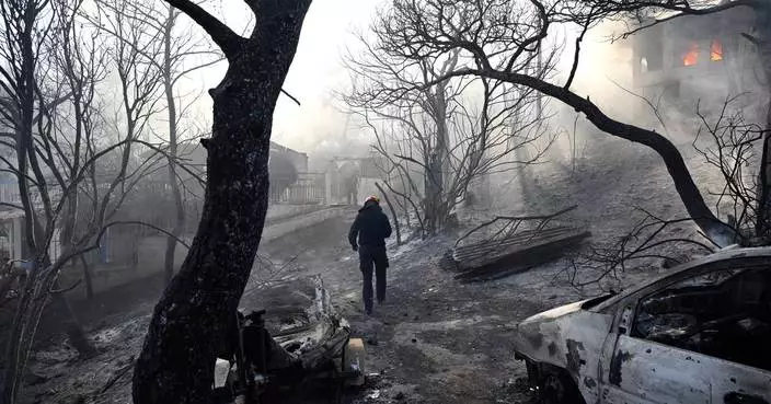 Belgian wildfire approaches Germany as Greece probes deadly blaze