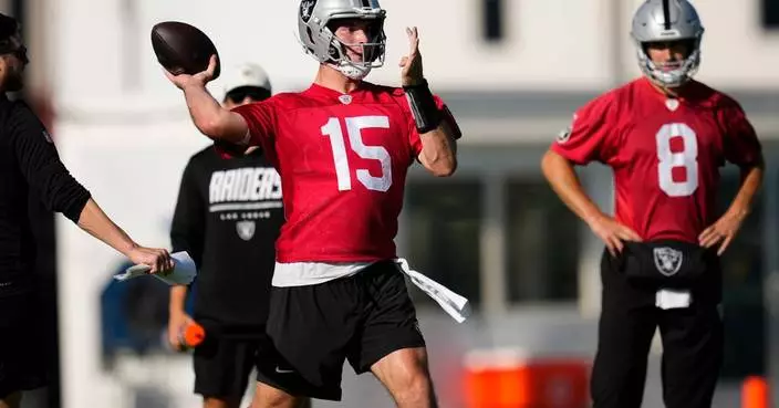 A fired-up Kirk Cousins digs in as Raiders starter while Fernando Mendoza surges in camp
