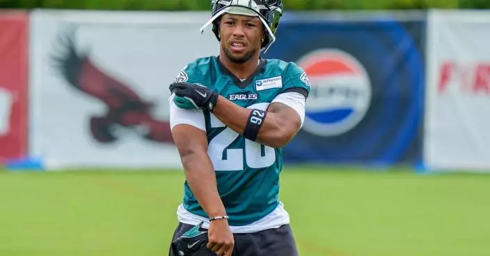 Eagles running back Saquon Barkley was inspired by Barry Sanders serving his teammates