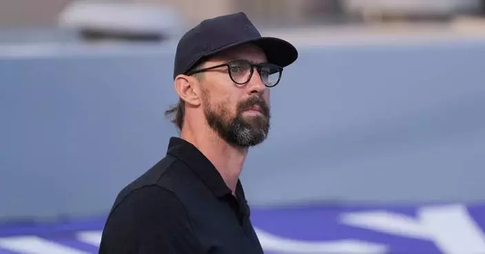 Michael Phelps returns poolside with his sons as 8-year-old Beckett eyes swimming