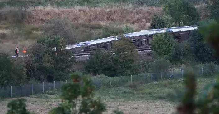 Passenger train derails and 11 people injured after carriages overturn in southern England