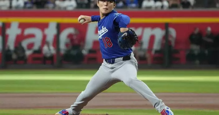 Ohtani's RBI infield single in the 10th helps Dodgers snap 7-game skid, beat D-backs 2-1