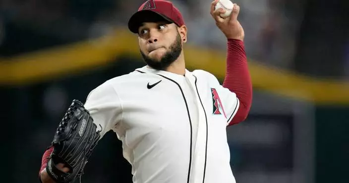 Eduardo Rodriguez strikes out 9 in 7 innings as Diamondbacks beat Cubs 2-0