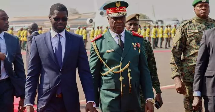 Guinea-Bissau votes in a referendum to grant expanded presidential powers ahead of election