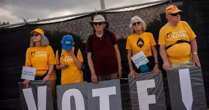 Thousands march in Washington to defend voting rights, in photos