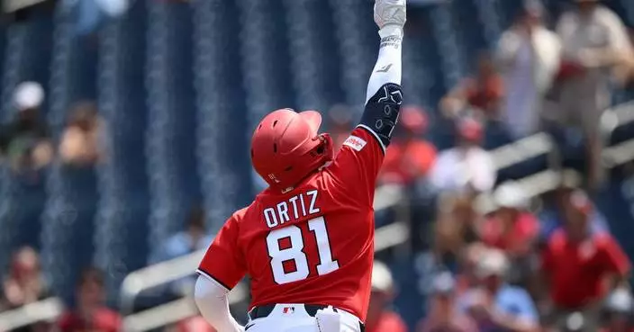 Ortiz hits 2nd career homer, Dion leads strong bullpen outing as Nationals beat Reds 7-1