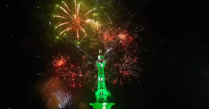 Fireworks light skies over Pakistan’s capital as crowds celebrate Independence Day