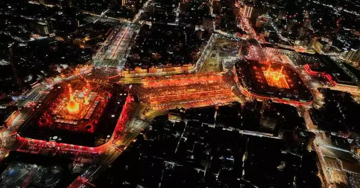 Pilgrims converge on Iraq's city of Karbala for the annual Arbaeen religious gathering, in photos