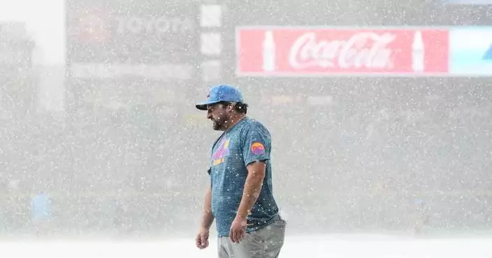 Sugano helps the Rockies beat the Royals 3-1 in game delayed at start by hailstorm