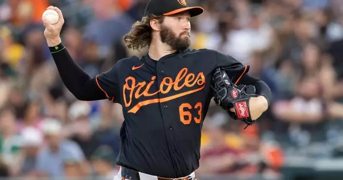 Mayo, Encarnacion-Strand lift the Orioles past the Athletics, 4-3 in 10 innings