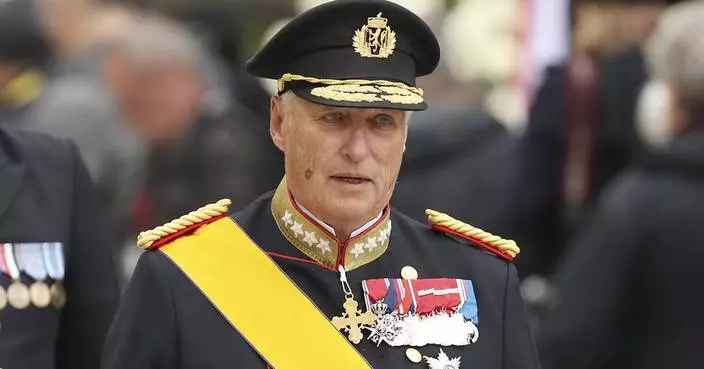 Norway's Queen Mette-Marit joins procession to bring late King Harald V's coffin to royal chapel