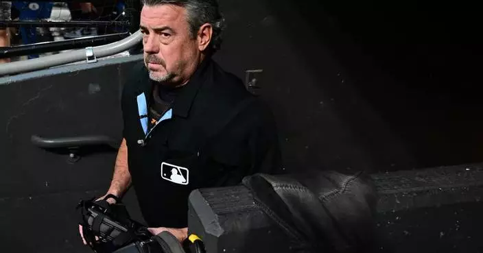 Umpire Jordan Baker out of Giants-Guards game due to concussion symptoms after foul ball hits mask