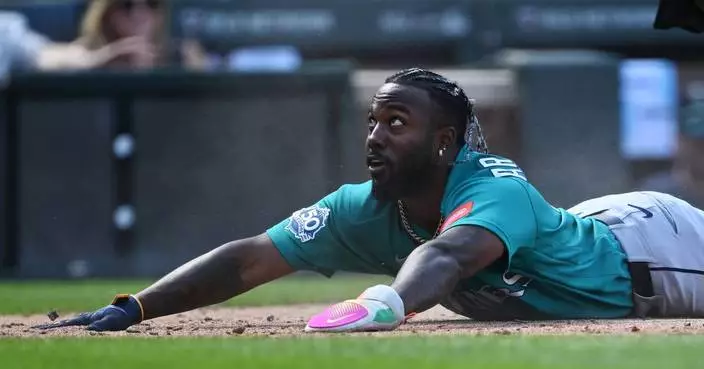 Anderson tosses 7 shutout innings, Mariners beat Rockies 2-1 to avoid elimination