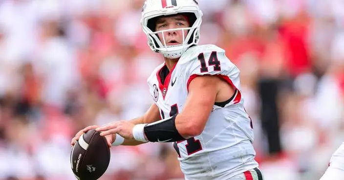 Gunner Stockton ties school record with 5 TD passes as No. 2 Georgia crushes Western Kentucky 70-20