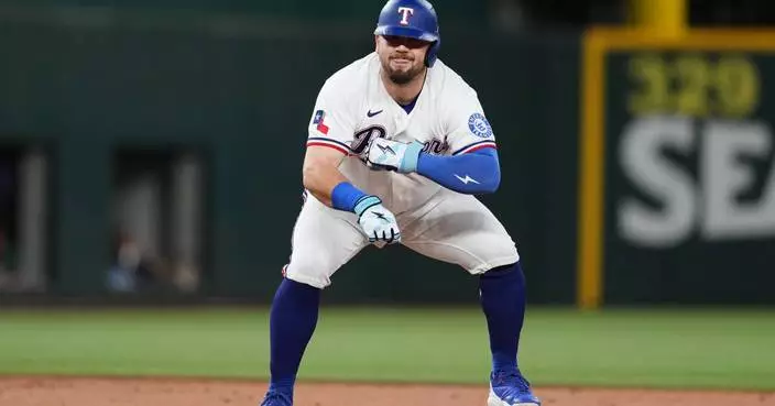Rangers reach .500 again and tie for AL West lead with 7-3 victory over Red Sox