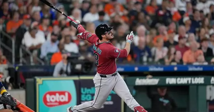 Nolan Arenado’s 2-run homer lifts the Diamondbacks past the Astros 3-2