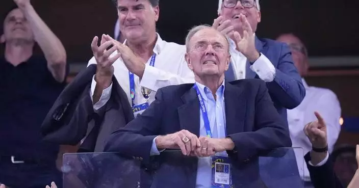 Dick Gould, who won 17 NCAA championships at Stanford, celebrated at the US Open