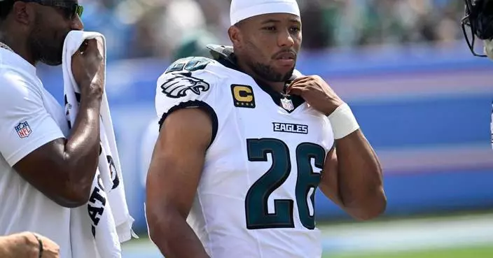 Eagles' Saquon Barkley returns after suffering left arm injury against Titans