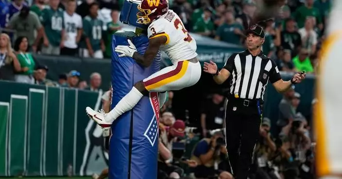 Stefon Diggs hugs the goalpost and gets flagged for costly penalty in Commanders' loss to Eagles