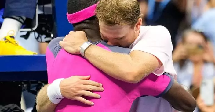 Tiafoe gives Michelsen a hug and a shoulder to cry on after his US Open victory