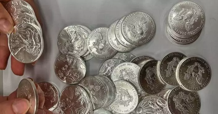 A tip about a swerving van leads police to 66,000 US silver coins in a fraud case
