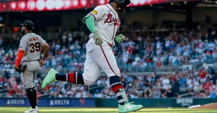 Devers hits his 30th homer as the Giants snap the Braves’ 7-game streak