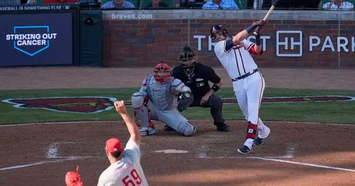 Austin Riley's 3-run homer off Jhoan Duran rallies Braves past Phillies 5-3 in NLWCS opener