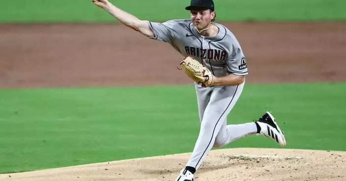 Arenado, Perdomo lead Diamondbacks over Padres 11-4 to stay alive in wild-card hunt