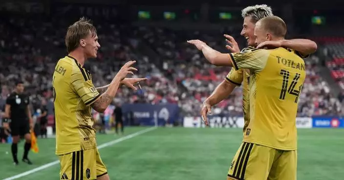 Tomas Totland and Conrad Wallem score 4 minutes apart as St. Louis City beats the Whitecaps 3-1