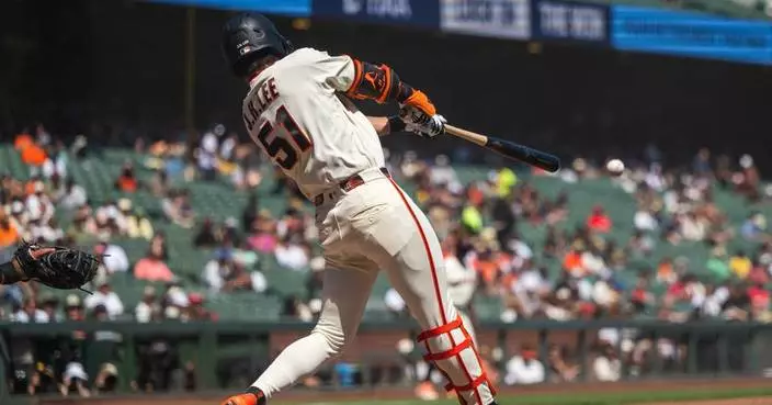 Whitcomb's double caps Giants' 6-run rally in a 7-6 victory over the Cardinals