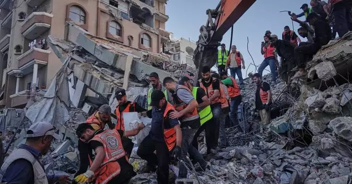 Building damaged by strikes collapses in Gaza, killing 21 as perilous living conditions persist