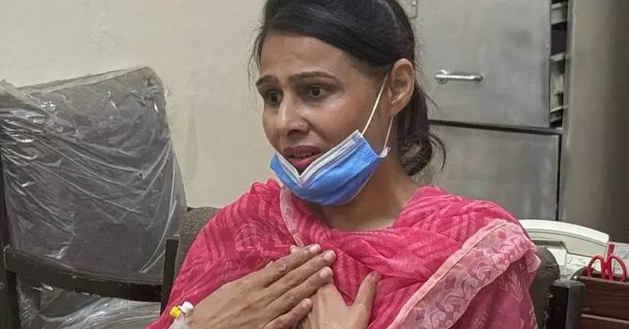 AP Exclusive: Nurse who saved baby from Pakistan hospital fire wishes she could have saved the rest