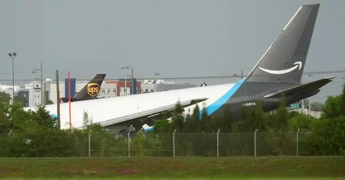 Amazon cargo plane sends up billowing cloud of smoke after overrunning runway at Miami airport