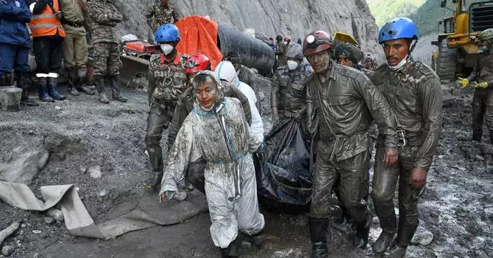 Rescuers dig 4 bodies from a Nepal hydropower tunnel as families demand answers