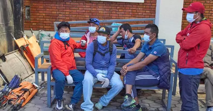 Rescue teams  search Nepal mountain for 12 swept by avalanche