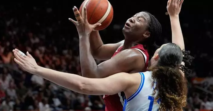 A gritty late surge lifts the US past Italy 55-52 in its toughest World Cup test in years