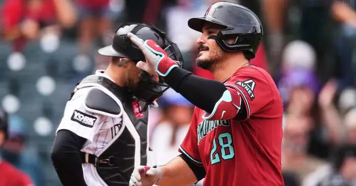 D-Backs maintain slim playoff hopes, beat Rockies 12-8 as Moreno, Arenado hit first-inning homers