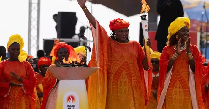 Olympic flame arrives in Senegal for the first Olympic event to be held in Africa
