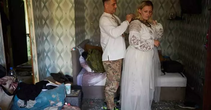 A Russian strike tore apart a couple's home on the eve of their wedding. They still got married