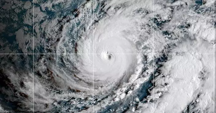 Hawaii residents told to expect tropical storm conditions as Hurricane Lowell passes to the west
