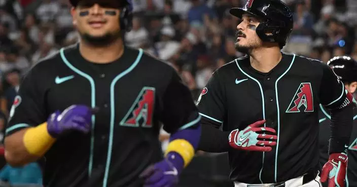 Arenado hits grand slam in the Diamondbacks' 8-4 victory over the Yankees