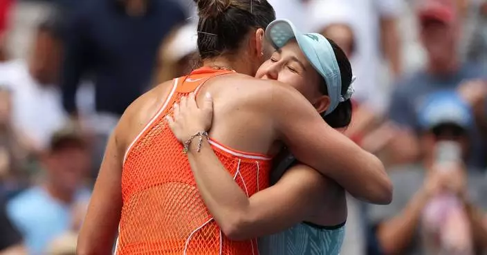 Sabalenka gets through tough test at the US Open, with Williams sisters in doubles action at night