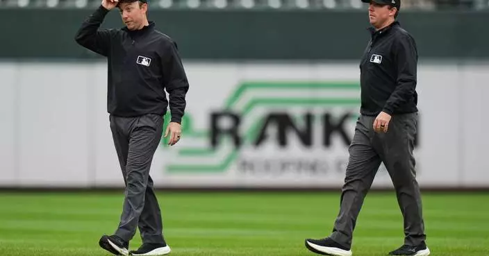 Twin brothers Austin and Tyler Jones ump big league games together for the first time