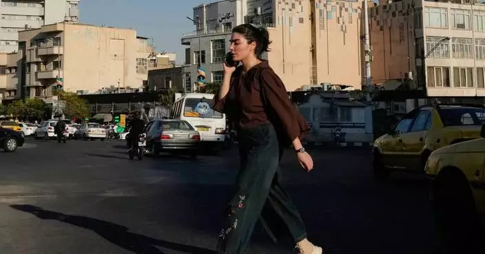Iran hesitates to clamp down on defiance of headscarf rules as war and economic pressures mount