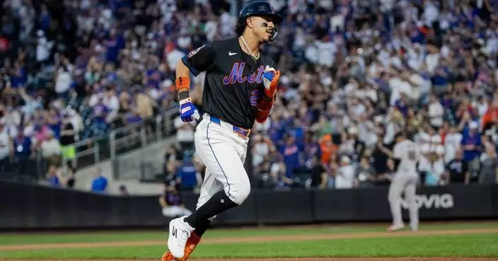 Alvarez hits 2 homers and Mets go deep 5 times to back McLean in 10-6 win over Giants
