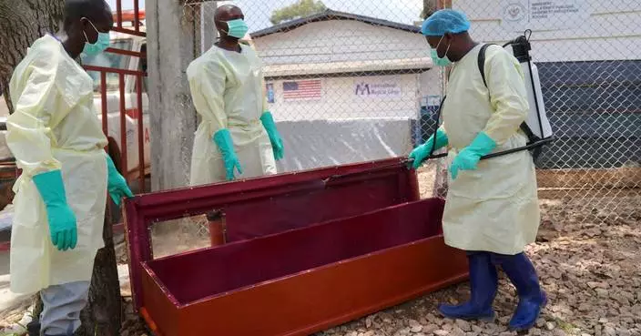 Congo’s Ebola burial teams battle community anger, fatigue and fear of infection