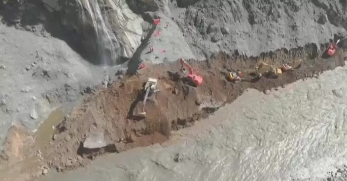 Rescuers race to clear last stretch of cut-off road at mudslide-hit Xizang port