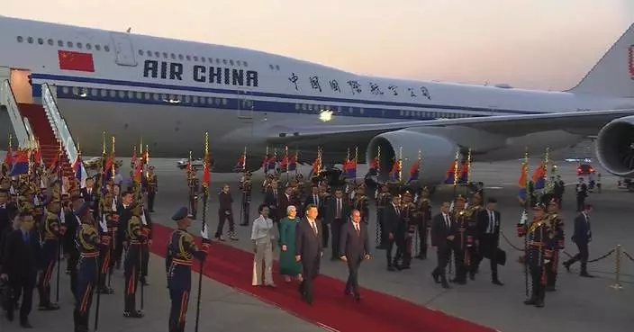 Xi arrives in Cairo for state visit to Egypt