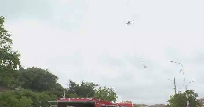 Drones rush emergency supplies to flood-stranded teachers, students in Zhejiang