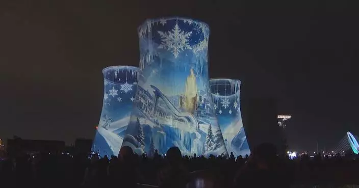 Shougang Park lights up cooling towers with 3D light show ahead of trade services fair